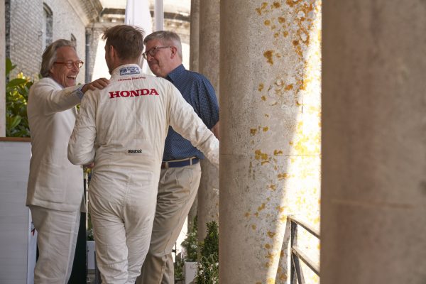 The Duke of Richmond, Jenson Button & Ross Brawn on the balcony at Goodwood House FoS 2018